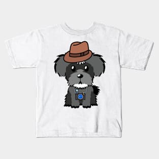 Funny schnauzer is holding a camera Kids T-Shirt